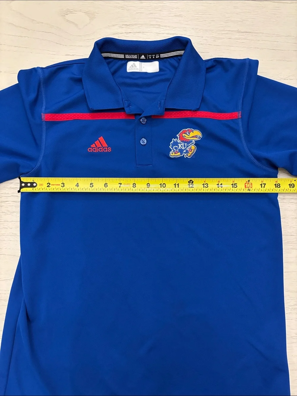 Adidas Kansas Jayhawks (KU) performance polo shirt in men’s size Small.